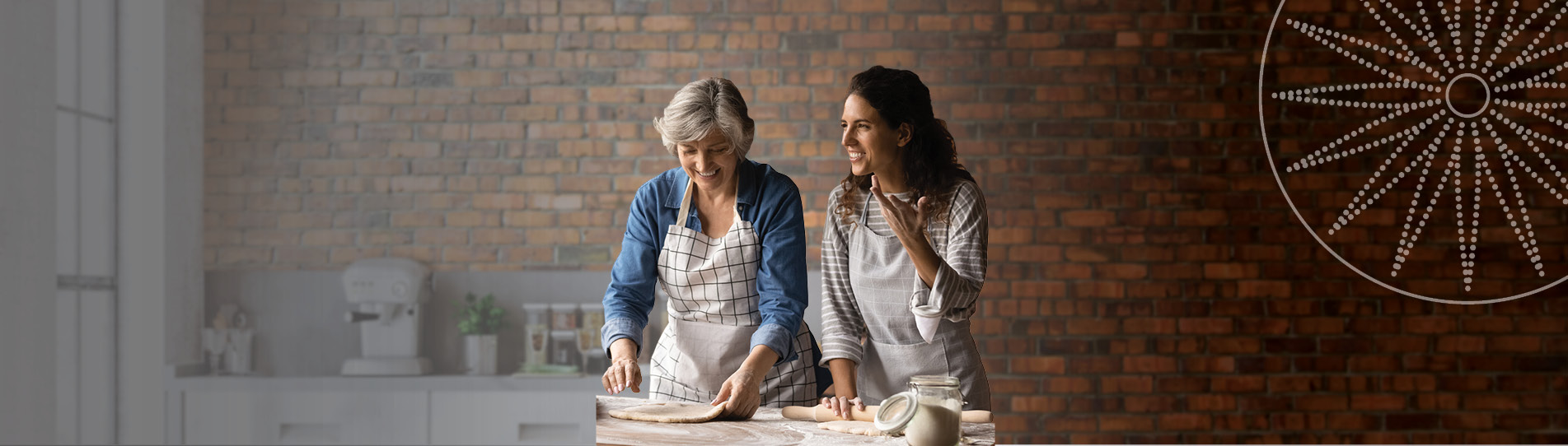 two women baking and smiling